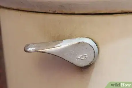 Image titled Adjust Toilet Tank Handles Step 1