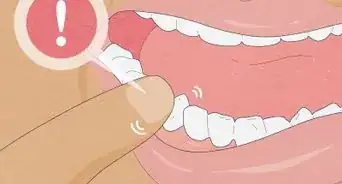 Pull a Loose Tooth at Home