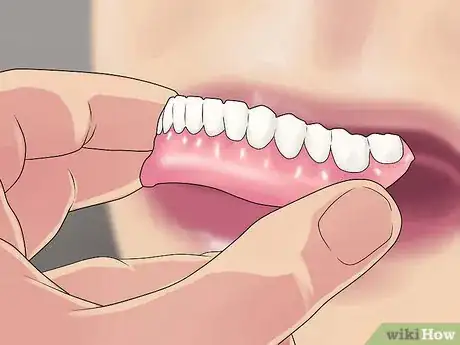 Image titled Remove Denture Adhesive from Gums Step 4