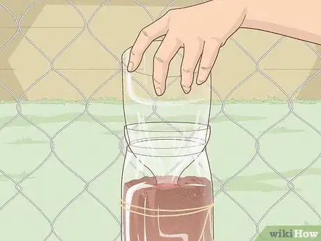 Image titled Build a Vertical Garden from Soda Bottles Step 13