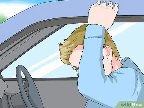 Image titled Get out of a Car Without Getting Shocked by Static Electricity Step 1
