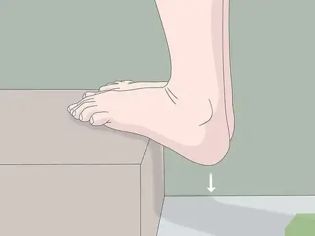 Image titled Stretch the Arch of Your Foot Step 4