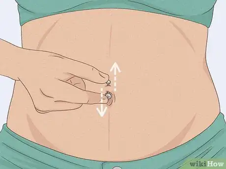 Image titled Manage Belly Button Rings During Pregnancy Step 1