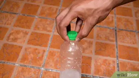 Image titled Do the Water Bottle Flipping Challenge Step 4