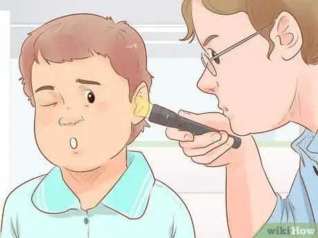 Image titled Remove Something Stuck in a Child's Ear Step 1