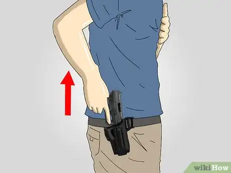 Image titled Do a Tactical Quickdraw With a Pistol Step 2