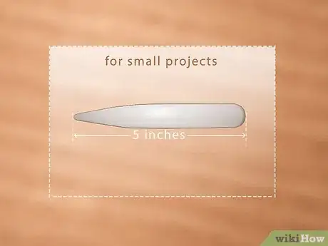 Image titled Use a Bone Folder Step 11