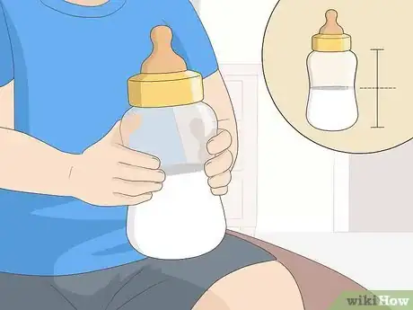 Image titled Get Your Child to Hold Their Own Bottle Step 6