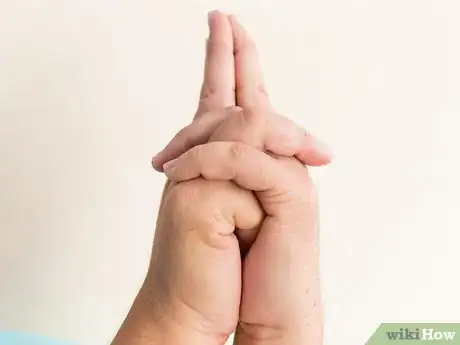 Image titled Do a Snake Hand Trick Step 7