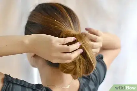 Image titled Put Waist Length Hair in a Shower Cap Step 1