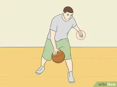 Image titled Dribble a Basketball Between the Legs Step 12.jpeg