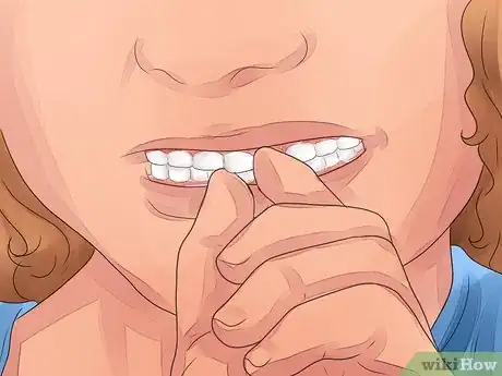 Image titled Make a Loose Tooth Fall Out Without Pulling It Step 4