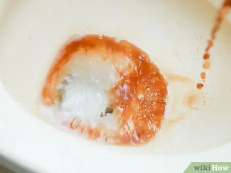 Image titled Clean a Toilet with Coke Step 2