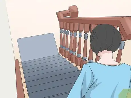 Image titled Not Fall Down Stairs Step 1