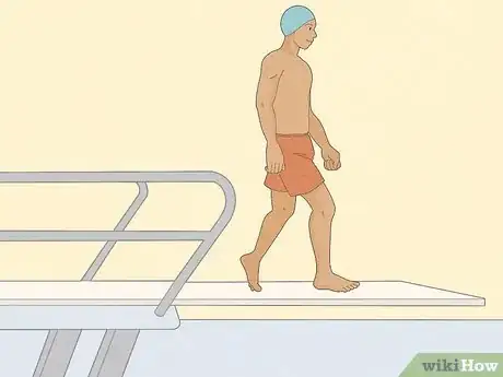 Image titled Do a Swan Dive From the Side of a Swimming Pool Step 1