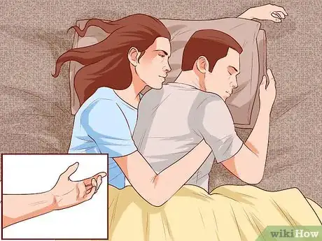 Image titled Avoid Trapping Your Arm While Snuggling in Bed Step 7