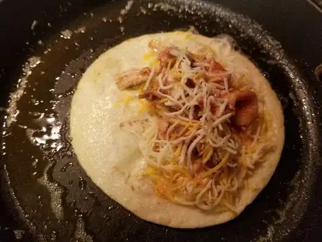 Image titled Added_chicken_in_tortilla