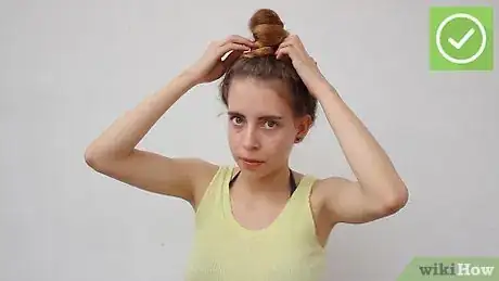 Image titled Do a Messy Bun (for Curly Hair) Step 18