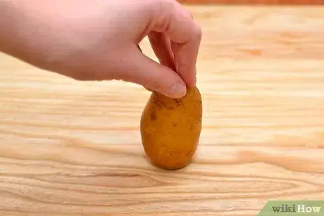 Image titled Peel Potatoes With an Ordinary Kitchen Knife Step 7