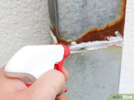 Image titled Caulk Rain Gutters Step 1