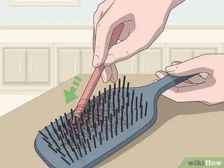 Image titled Clean a Paddle Brush Step 1.jpeg