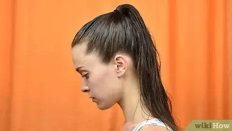 Image titled Do a Slick Bun Step 13