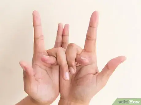 Image titled Do a Snake Hand Trick Step 13