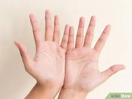 Image titled Do a Snake Hand Trick Step 11