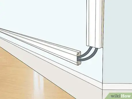 Image titled Hide a TV Cable Step 1