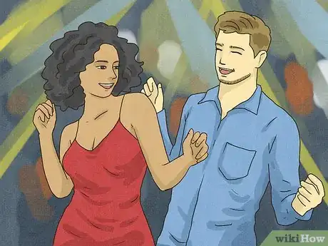 Image titled Flirt when Dancing Step 4