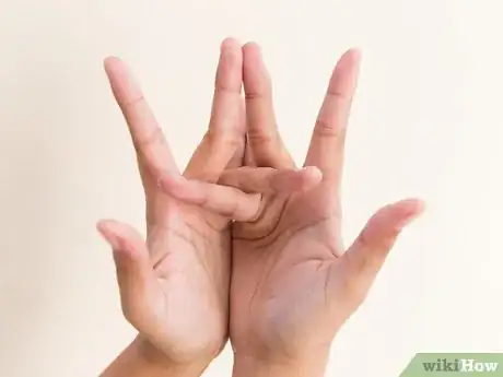 Image titled Do a Snake Hand Trick Step 12