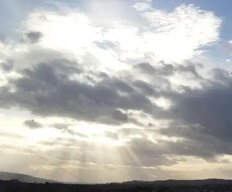 Image titled Suns rays through clouds