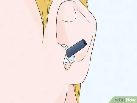 Image titled Cover Your Ears While Swimming Step 1