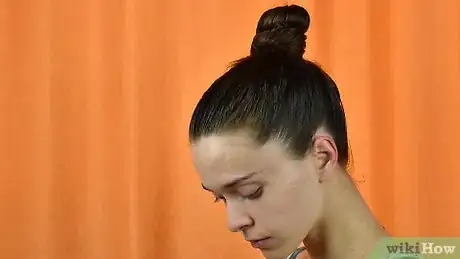 Image titled Do a Slick Bun Step 23