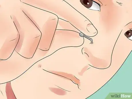 Image titled Take Your Nose Stud in and out of Your Nose Step 4