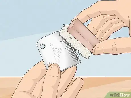 Image titled What Can You Use to Clean Your Clipper Blades Step 1