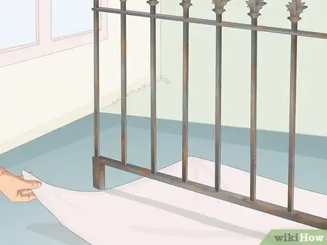 Image titled Prepare a Wrought Iron Fence for Painting Step 1