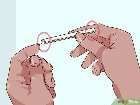 Image titled Roll Trick Marijuana Joints Step 1