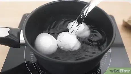 Image titled Tell When an Egg Is Boiled Step 1