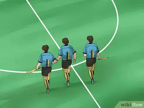 Image titled Signal and Position Yourself As an Assistant Referee in Soccer Step 3