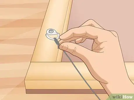 Image titled Hang a Masonite Board Painting Step 7