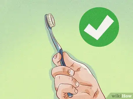 Image titled Brush Your Teeth with a Tongue Piercing Step 2