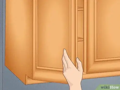 Image titled Whitewash Cabinets Step 1