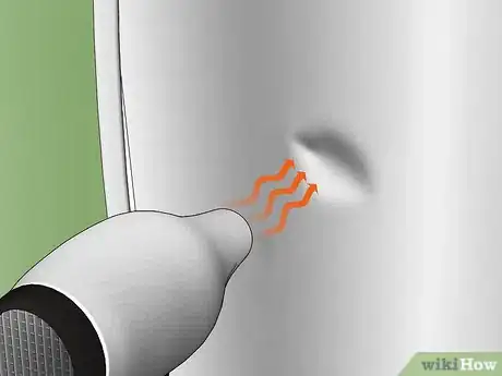 Image titled Remove a Dent from a Stainless Steel Refrigerator Step 1