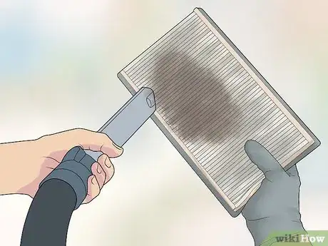 Image titled Clean an Air Filter Step 2