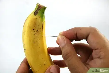 Image titled Slice a Banana Before It Is Peeled Step 4