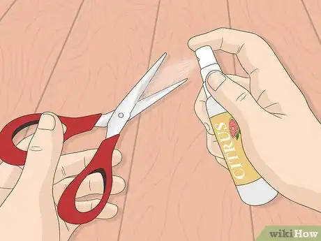 Image titled Clean Adhesive from Scissors Step 2