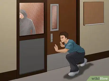 Image titled Disarm a Criminal with a Handgun Step 10