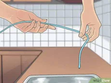 Image titled Use a Urinary Catheter for a Female Step 7