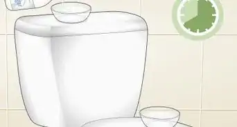 Clean a Toilet Bowl with Vinegar and Baking Soda